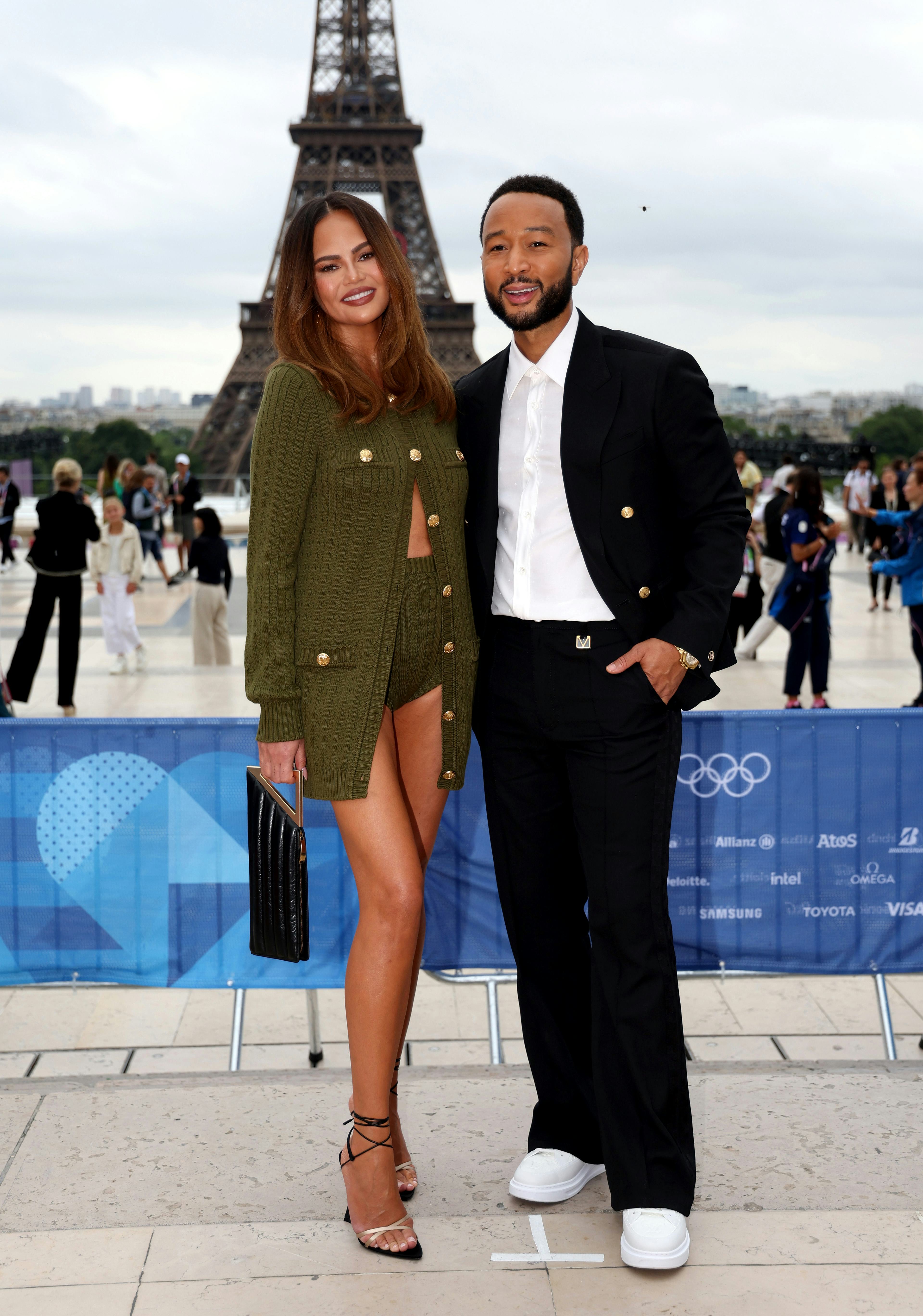 Chrissy Teigen wore olive green micro shorts to the Olympics.