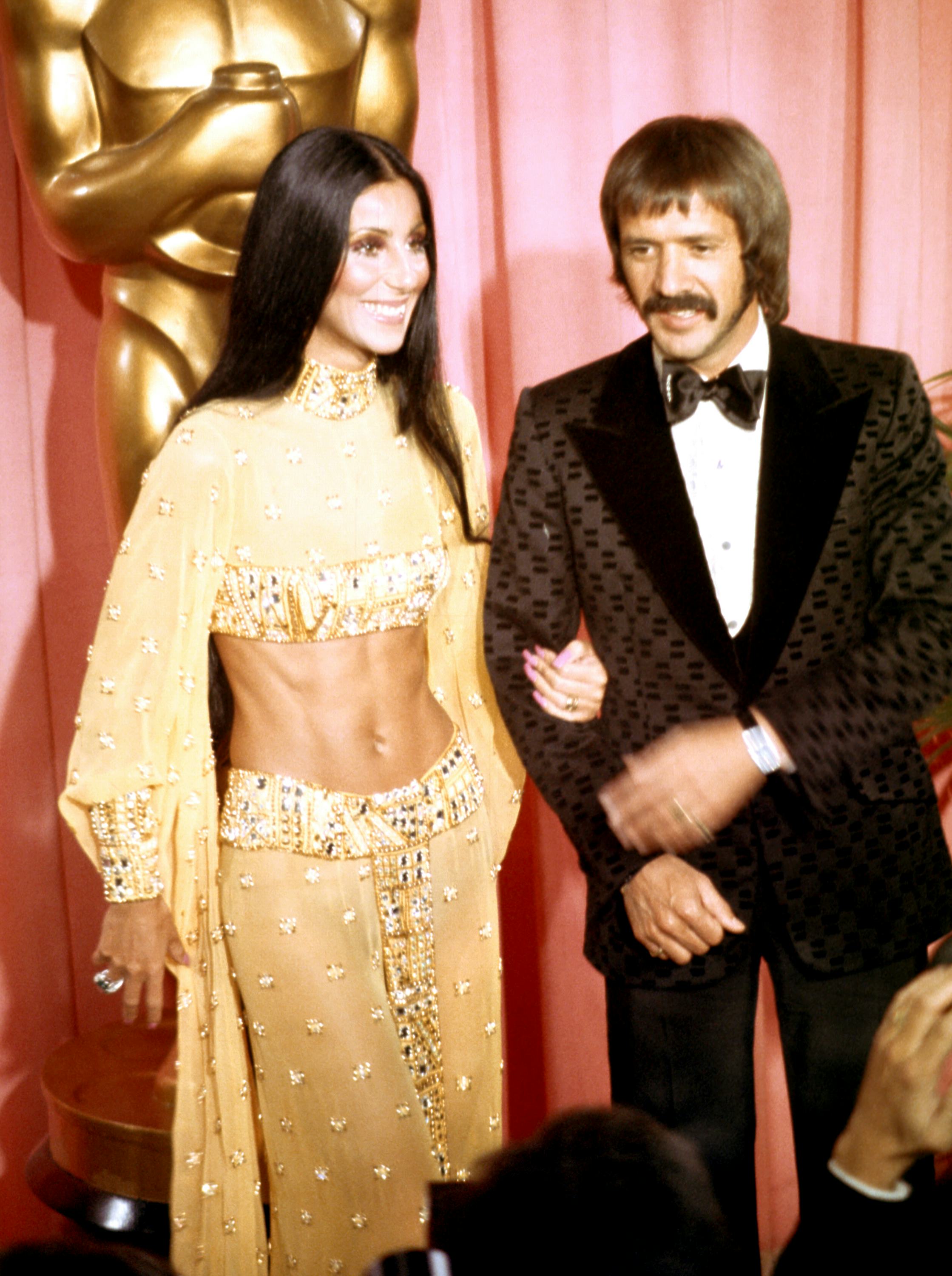 Cher in a sparkly two-piece, one of her most revealing looks of all time, at the Academy Awards with&hellip;