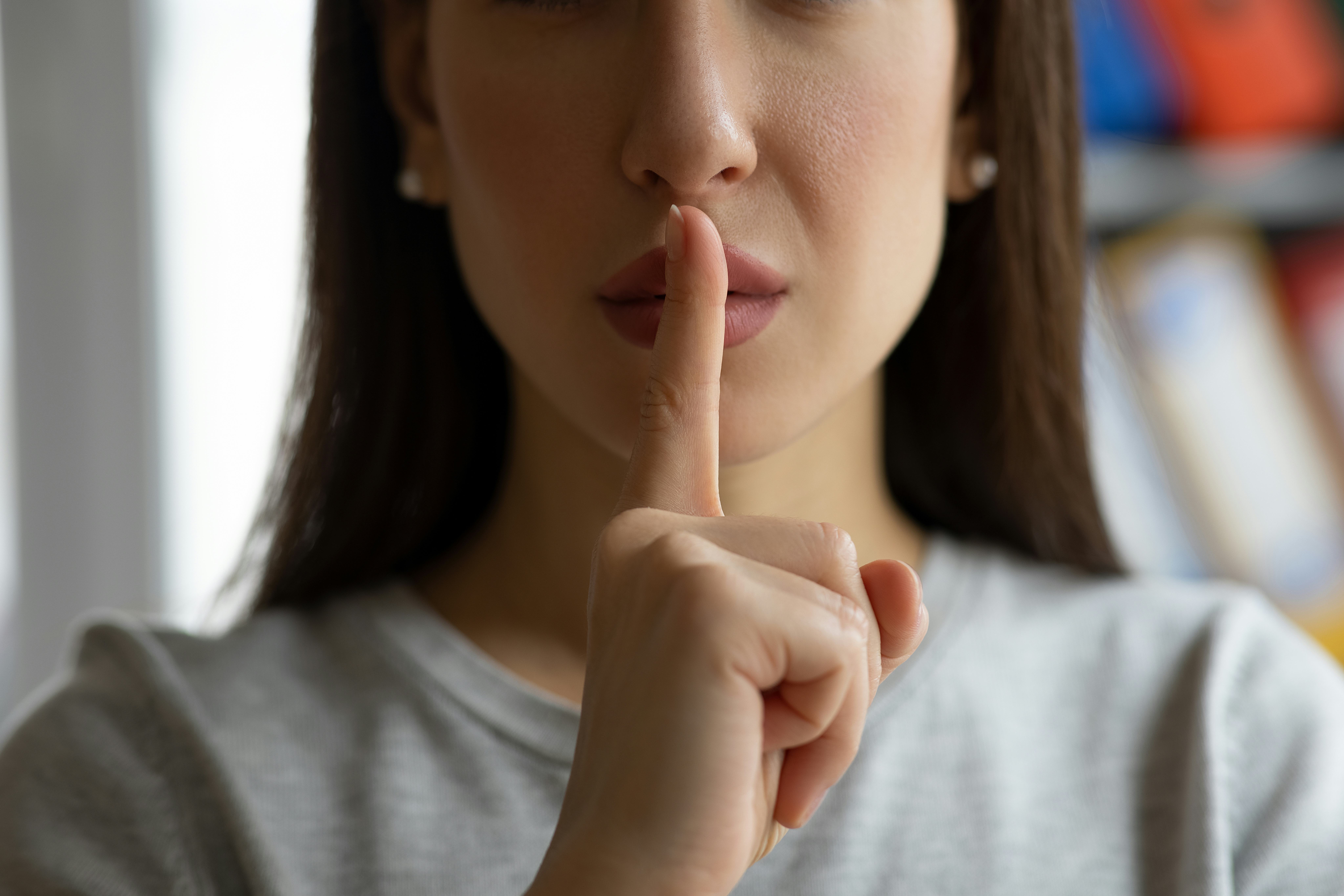 Woman asking for silence