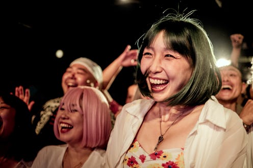 Group of people having fun at music concert