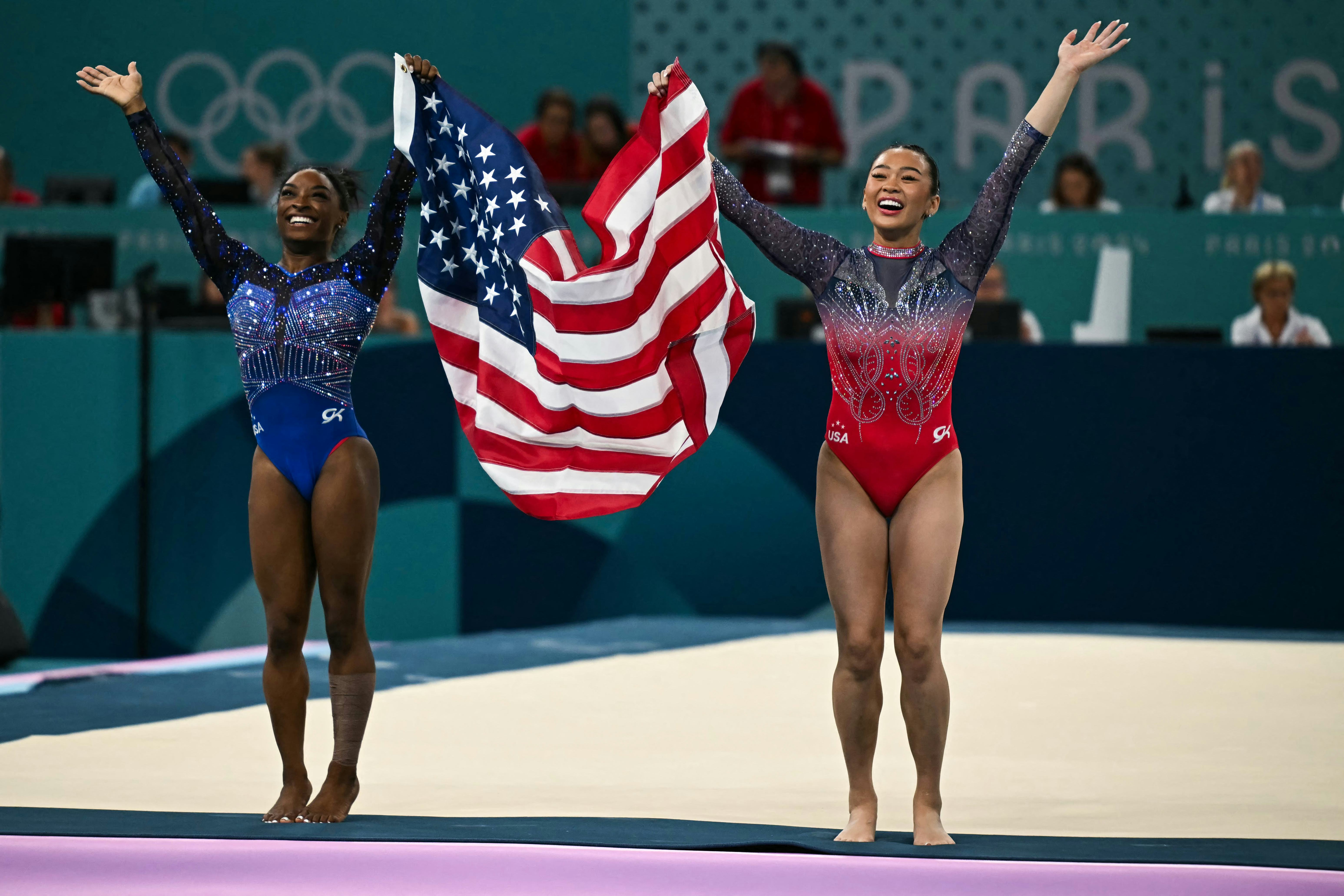 Winner US' Simone Biles and third-placed US' Sunisa Lee celebrate after the artistic gymnastics wome&hellip;