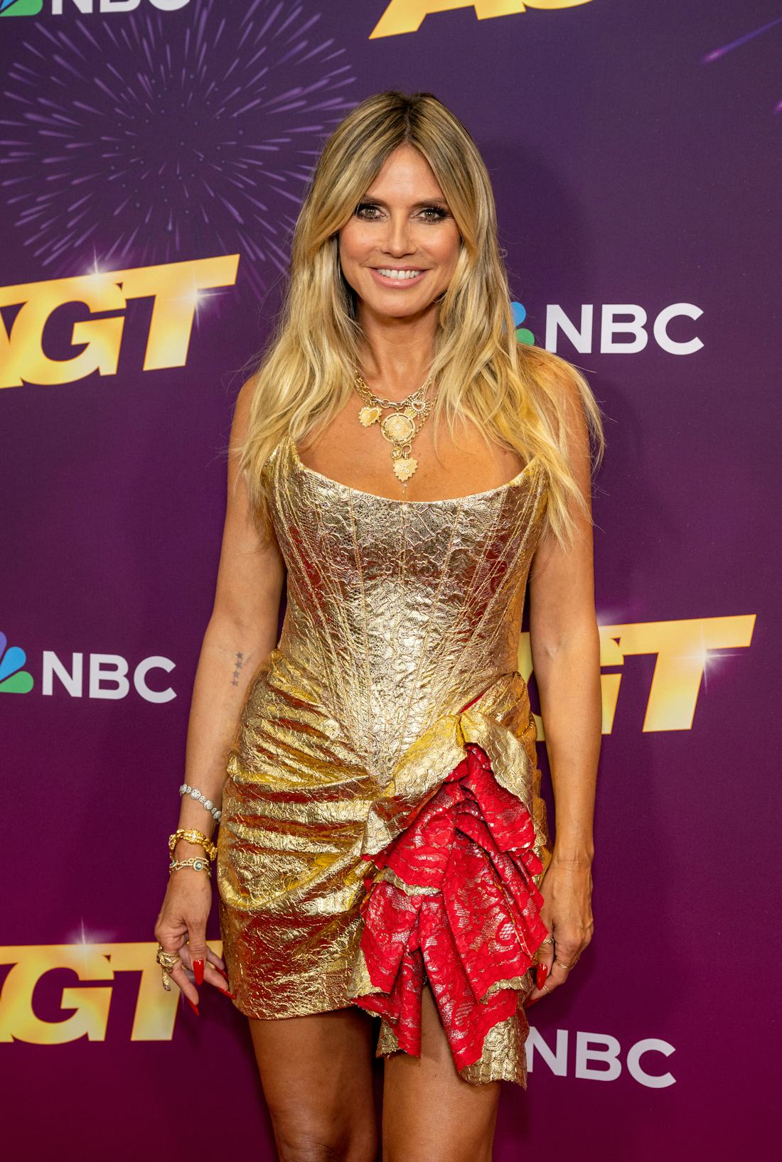 Heidi Klum Wore A Strapless Gold Bustier Mini Dress For 'AGT'