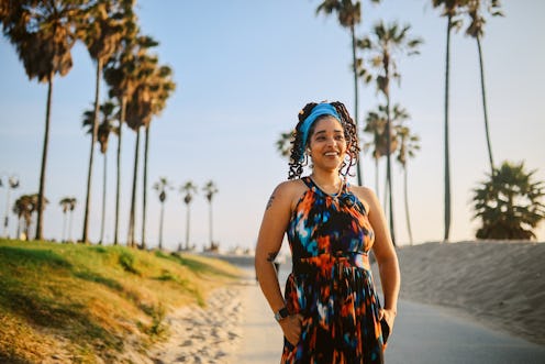 Woman spending a slow and easy afternoon near the beach in Venice, California, soaking sunlight, wal...