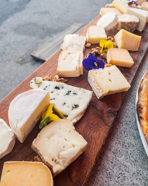 Cheese board with multiple flavors and textures, typical French food