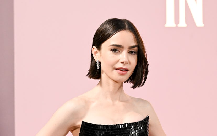 Lily Collins at the "Emily in Paris" Season 4, Part 1 Premiere held at The Egyptian Theatre Hollywoo...
