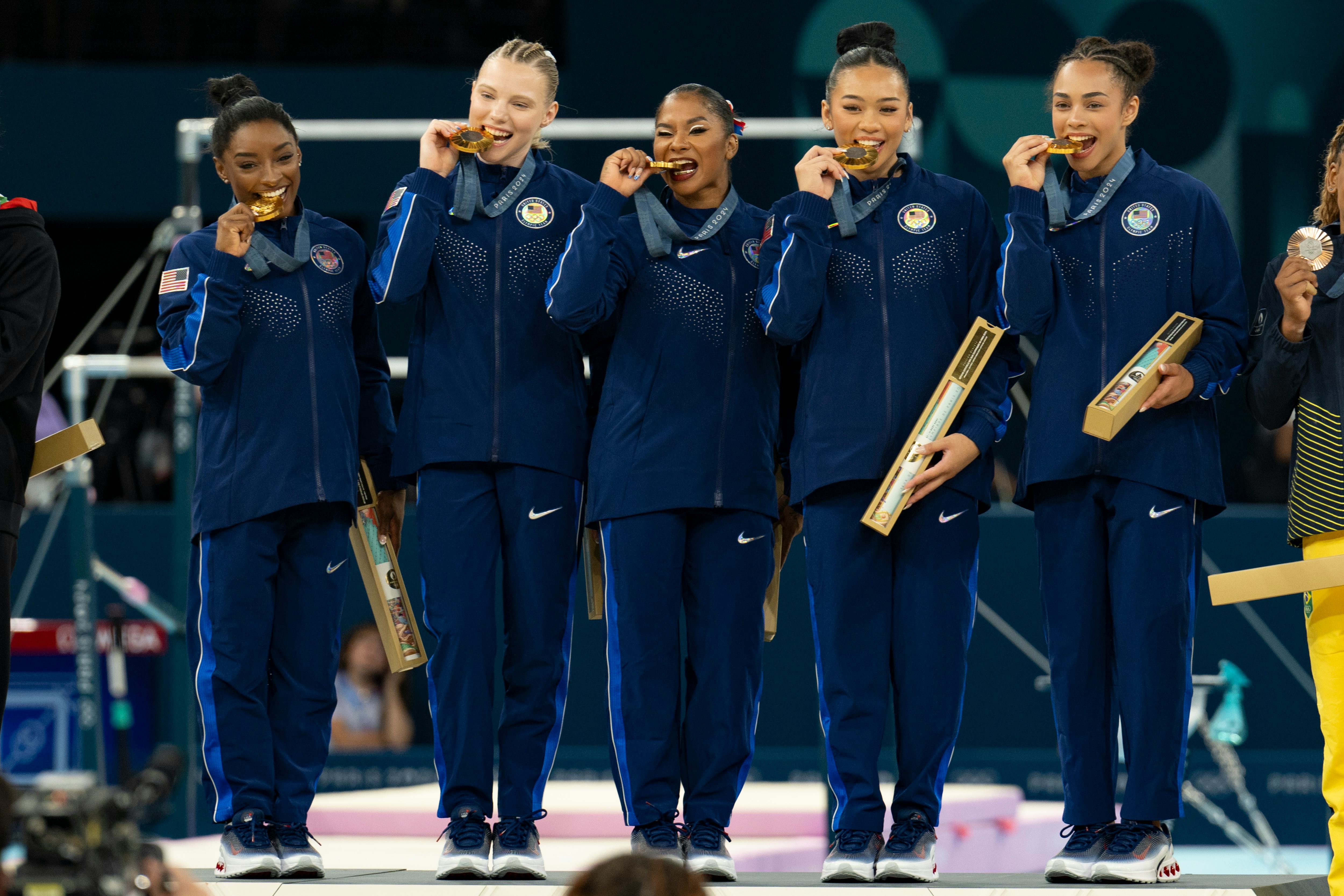 Jordan Chiles with her USA teammates after winning the gold medal.