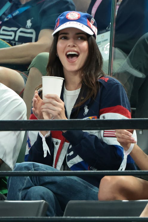 PARIS, FRANCE - AUGUST 1: Kendall Jenner cheers for Simone Biles of USA during the Artistic Gymnasti...