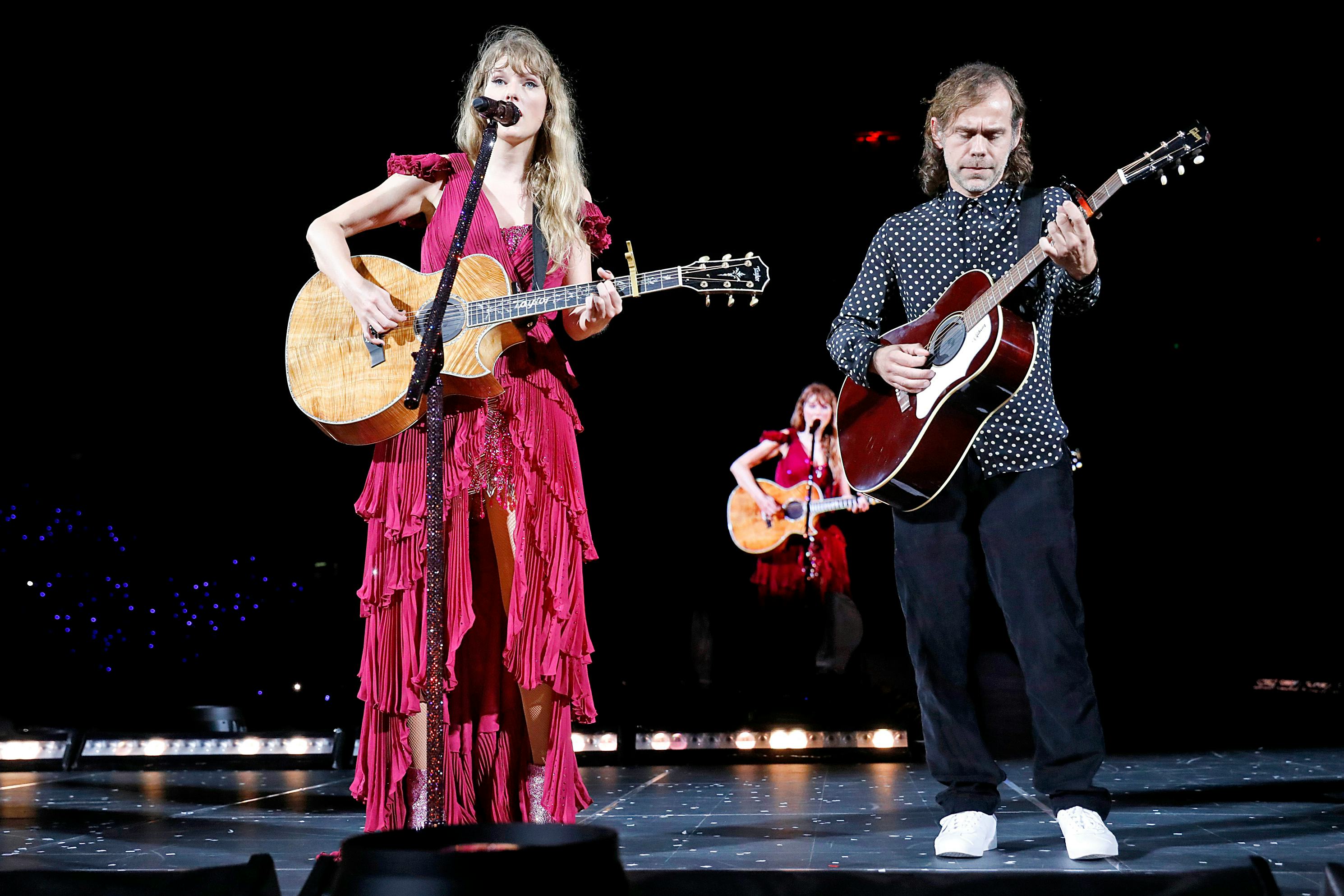Taylor Swift and Aaron Dessner perform on The Eras Tour