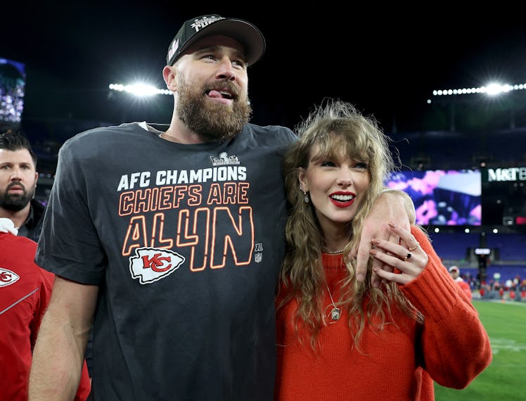 Travis Kelce #87 of the Kansas City Chiefs celebrates with Taylor Swift after a 17-10 victory agains...