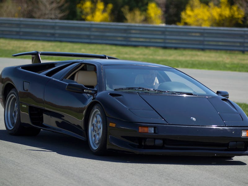 A 1991 Lamborghini Diablo is driven around the track at the Monticello Motor Club, in Monticello, Ne...
