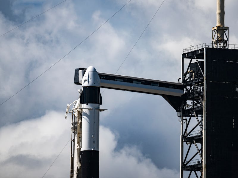 A SpaceX Falcon 9 rocket with the Crew Dragon Resilience capsule sits on Launch Complex 39A at Kenne...