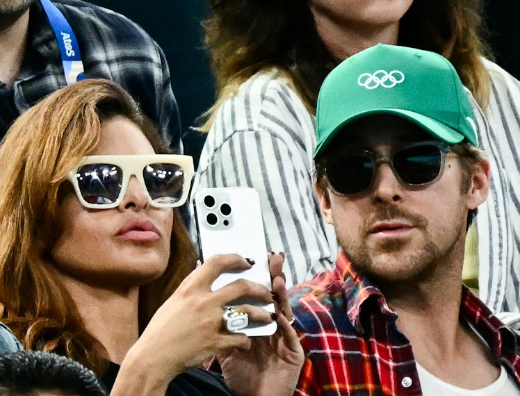 TOPSHOT - US actress Eva Mendes (L) and her partner Canadian actor Ryan Gosling (R) attend the artis...