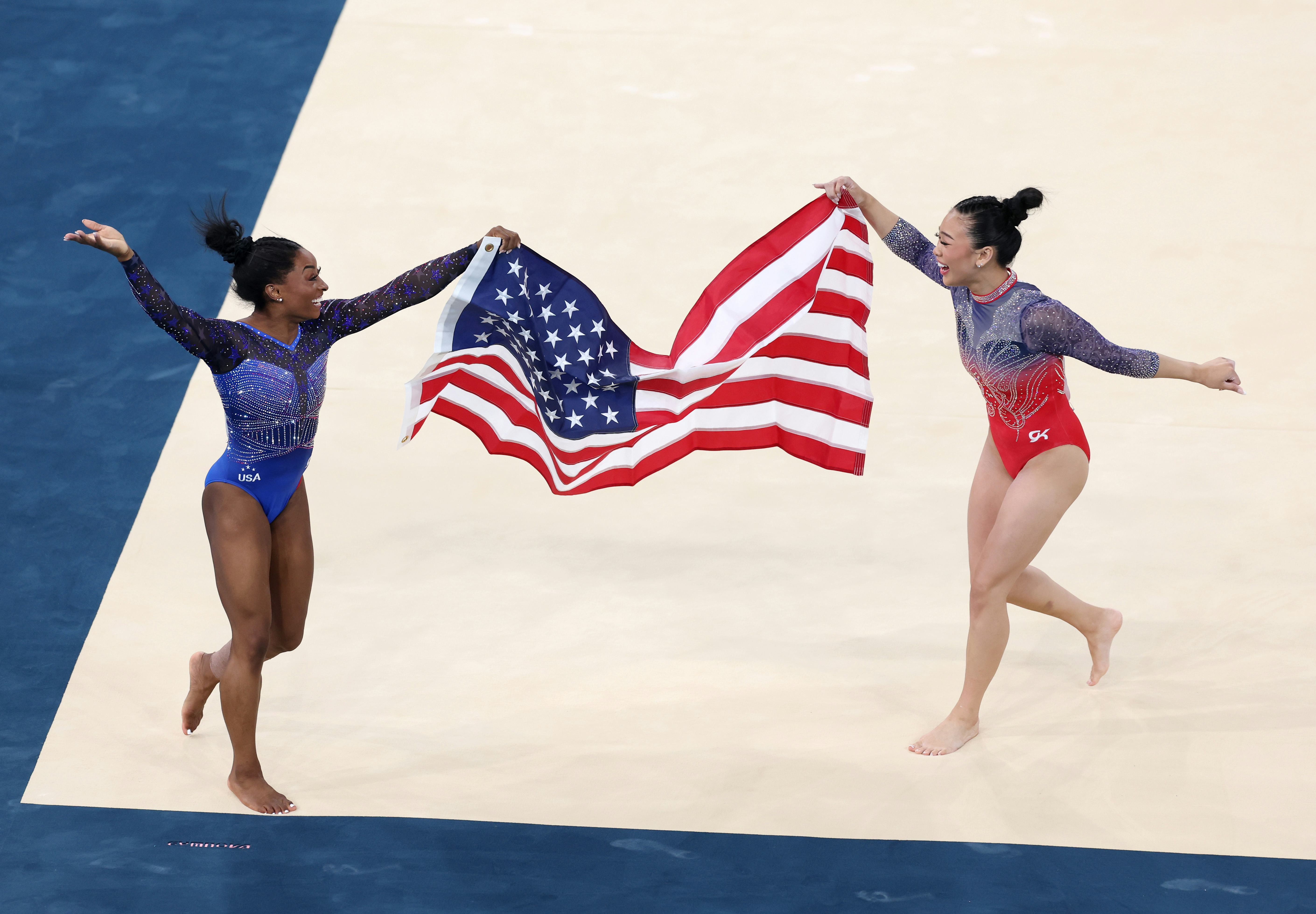 Simone Biles and Sunisa Lee of Team USA at the Olympic Games in Paris.