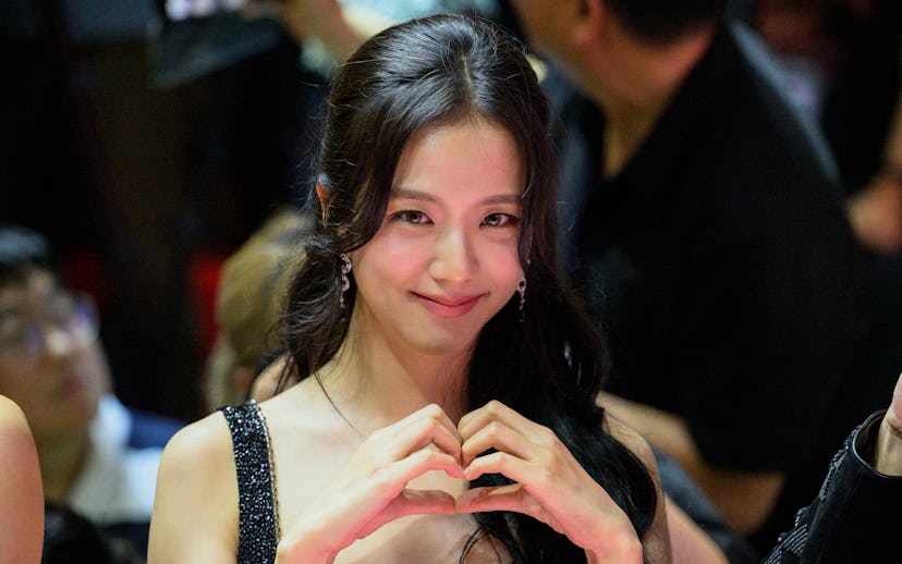 Jisoo of K-pop girl group BLACKPINK smiles during an event to promote her film 'Born Pink', marking ...