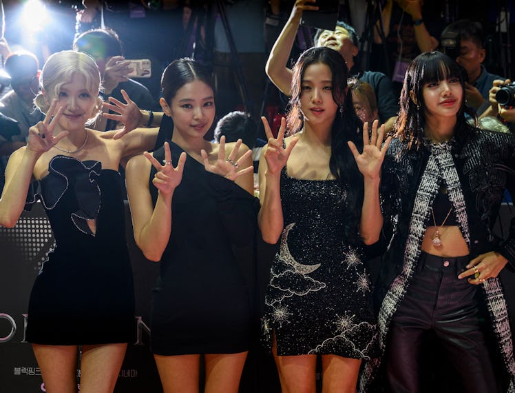 Rosé, Jennie, Jisoo and Lisa of K-pop girl group BLACKPINK pose during an event to promote their fil...