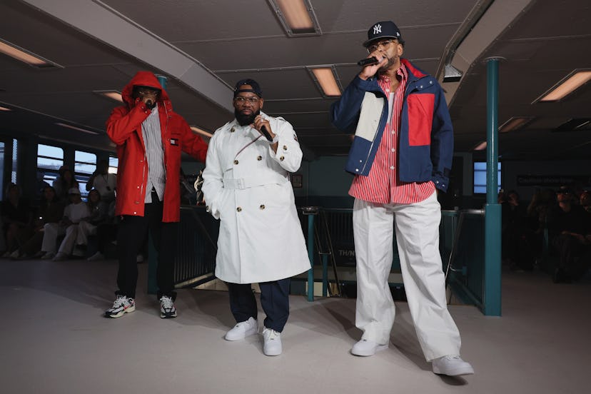Members of Wu-Tang Clan pose on the runway for the Tommy Hilfiger fashion show during the September …