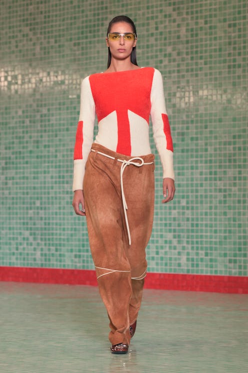 Model on the runway at Tory Burch RTW Spring 2025