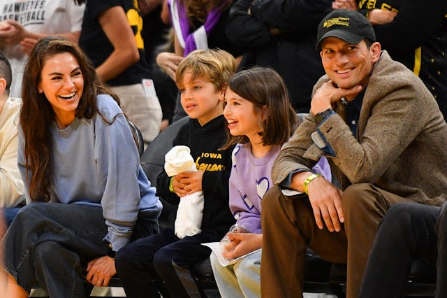 LOS ANGELES, CA - MAY 24: Actors Mila Kunis and Ashton Kutcher and their children look on during the...