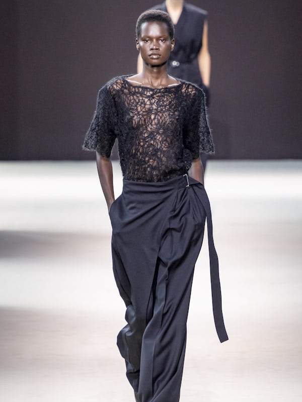 A model walks the runway during the COS Ready to Wear Spring/Summer 2025 fashion show as part of the…