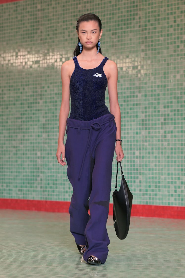 Model on the runway at Tory Burch RTW Spring 2025 held at Skylight at The Refinery as part of New Yo...