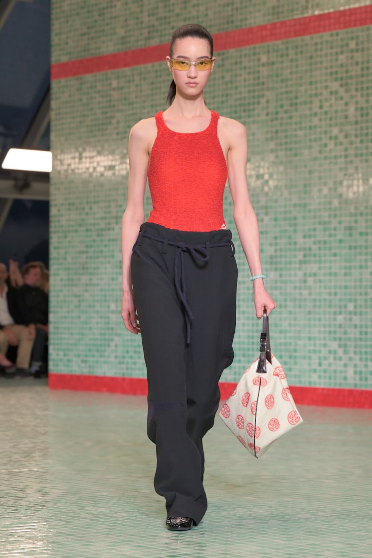 Model on the runway at Tory Burch RTW Spring 2025 held at Skylight at The Refinery as part of New Yo...