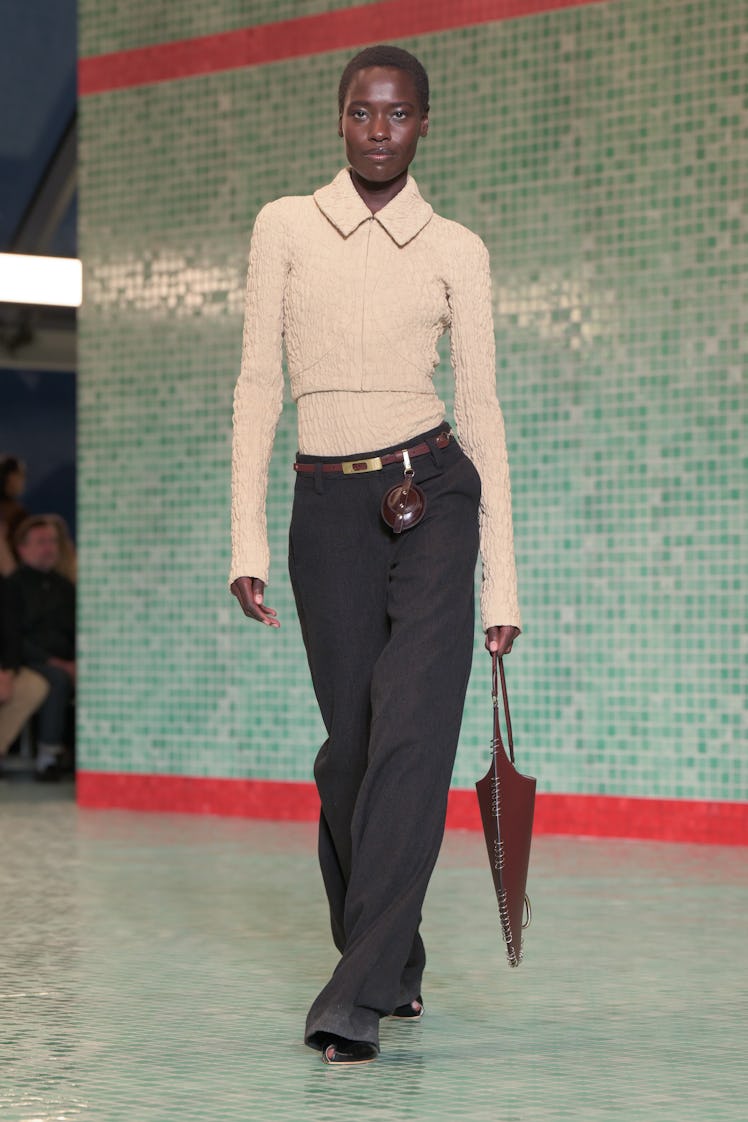 Model on the runway at Tory Burch RTW Spring 2025 held at Skylight at The Refinery as part of New Yo...