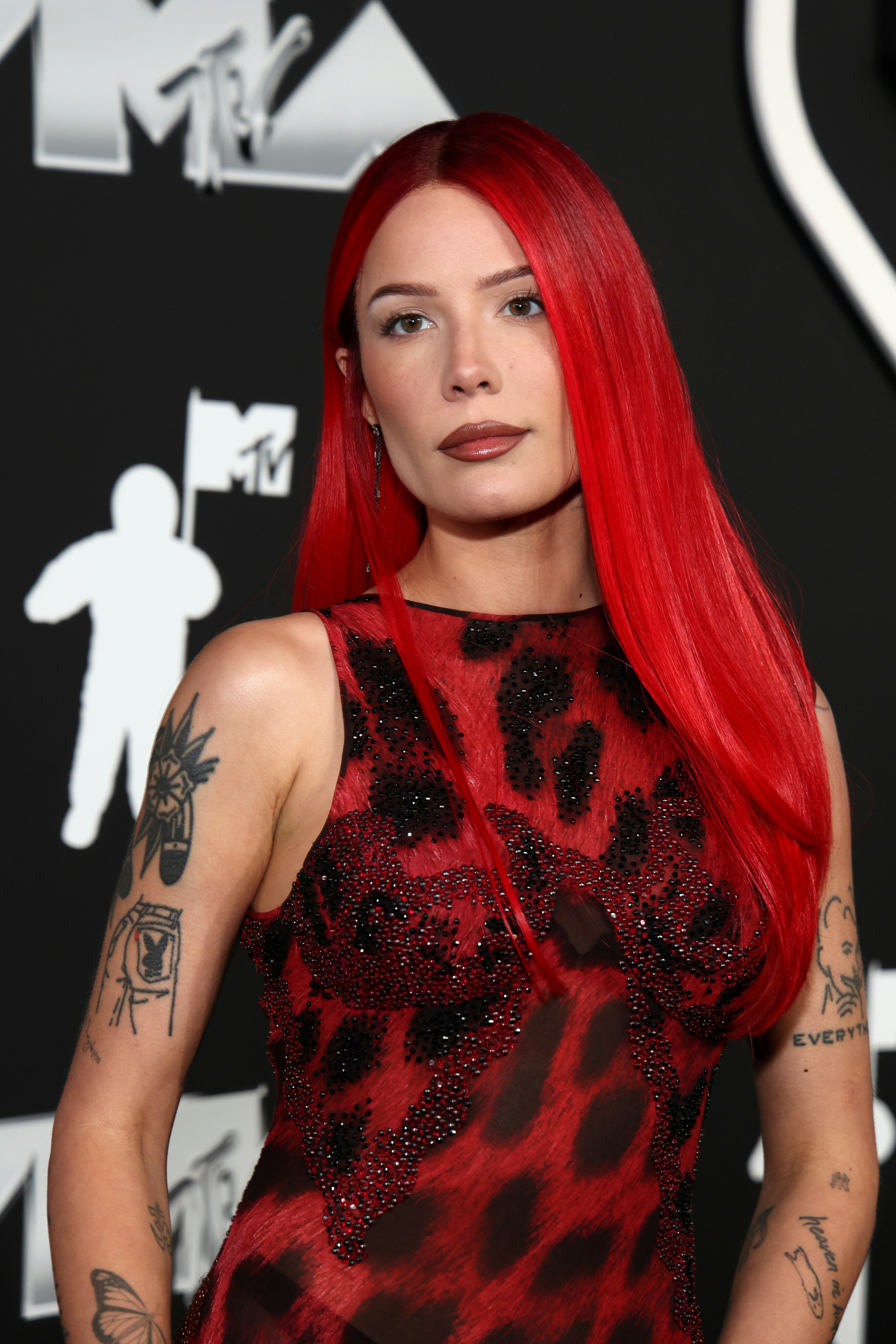 Halsey wore a super sleek red velvet hair color to the 2024 MTV Video Music Awards.