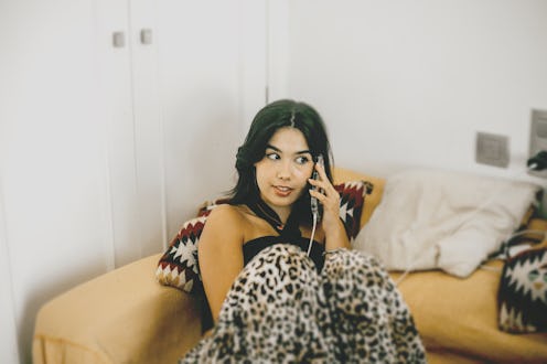 woman gossiping on the phone