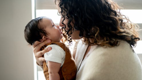 Mother cares for infant son