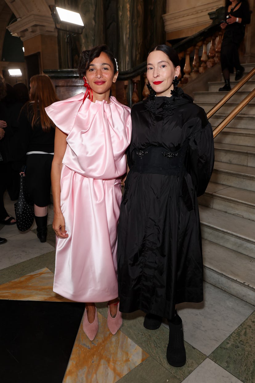 LONDON, ENGLAND - SEPTEMBER 15: Laila Gohar and Clara Cornet attend the Simone Rocha show during Lon...