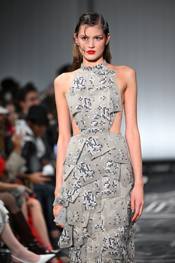 Cherry red lips and graphic red polka dots near the eyes were spotted at Apujan.