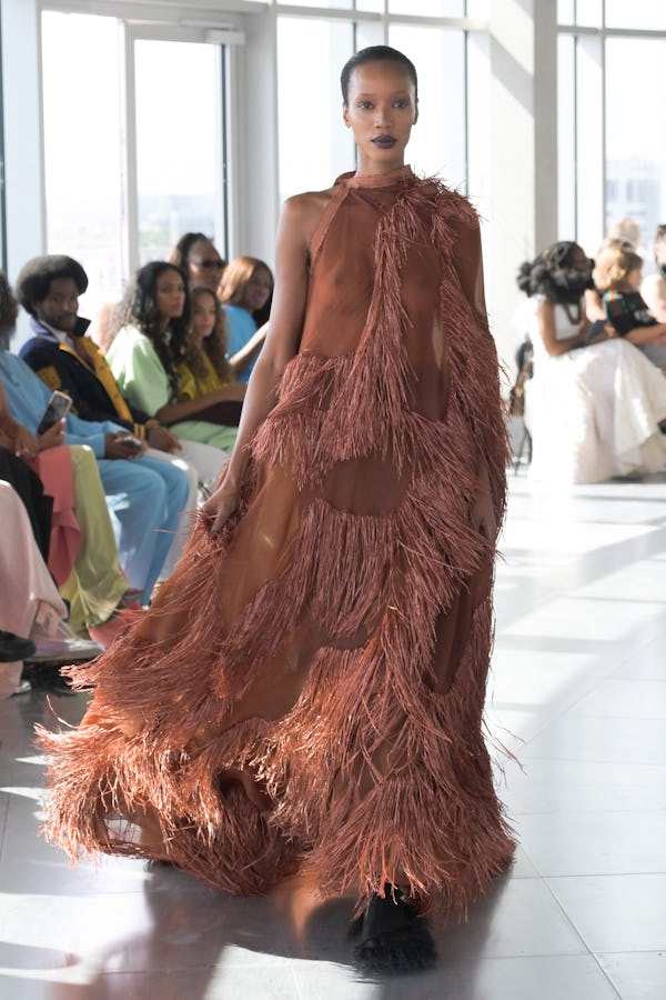 Dark grey-purple lip colors were spotted at Roksanda.