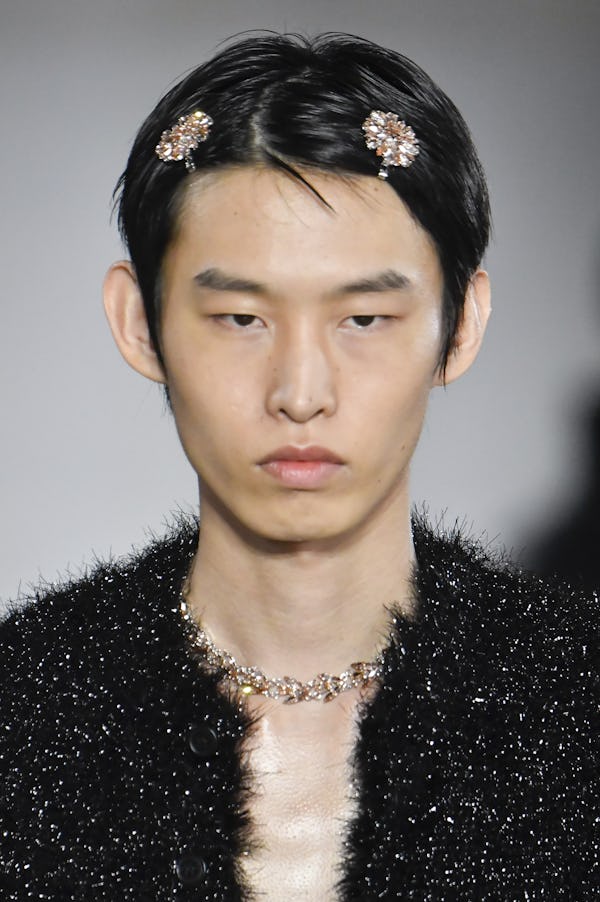 Hair barrettes on both male and female models were spotted at Simone Rocha.