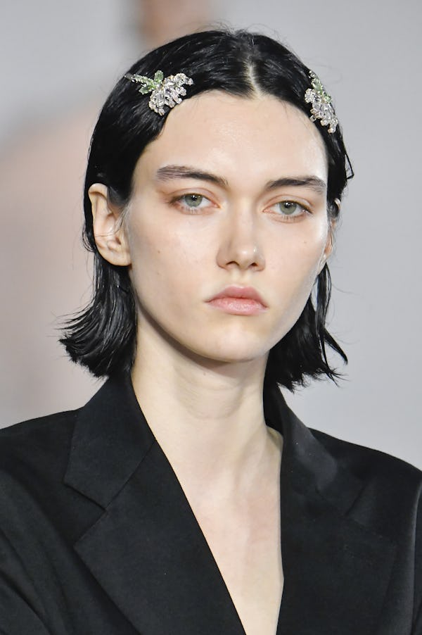 Hair barrettes on both male and female models were spotted at Simone Rocha.