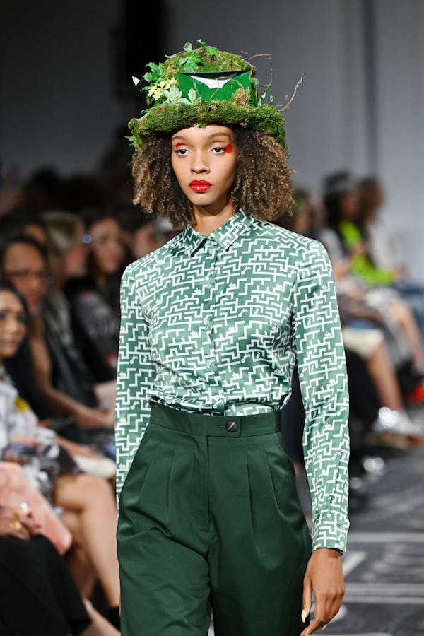 Cherry red lips and graphic red polka dots near the eyes were spotted at Apujan.