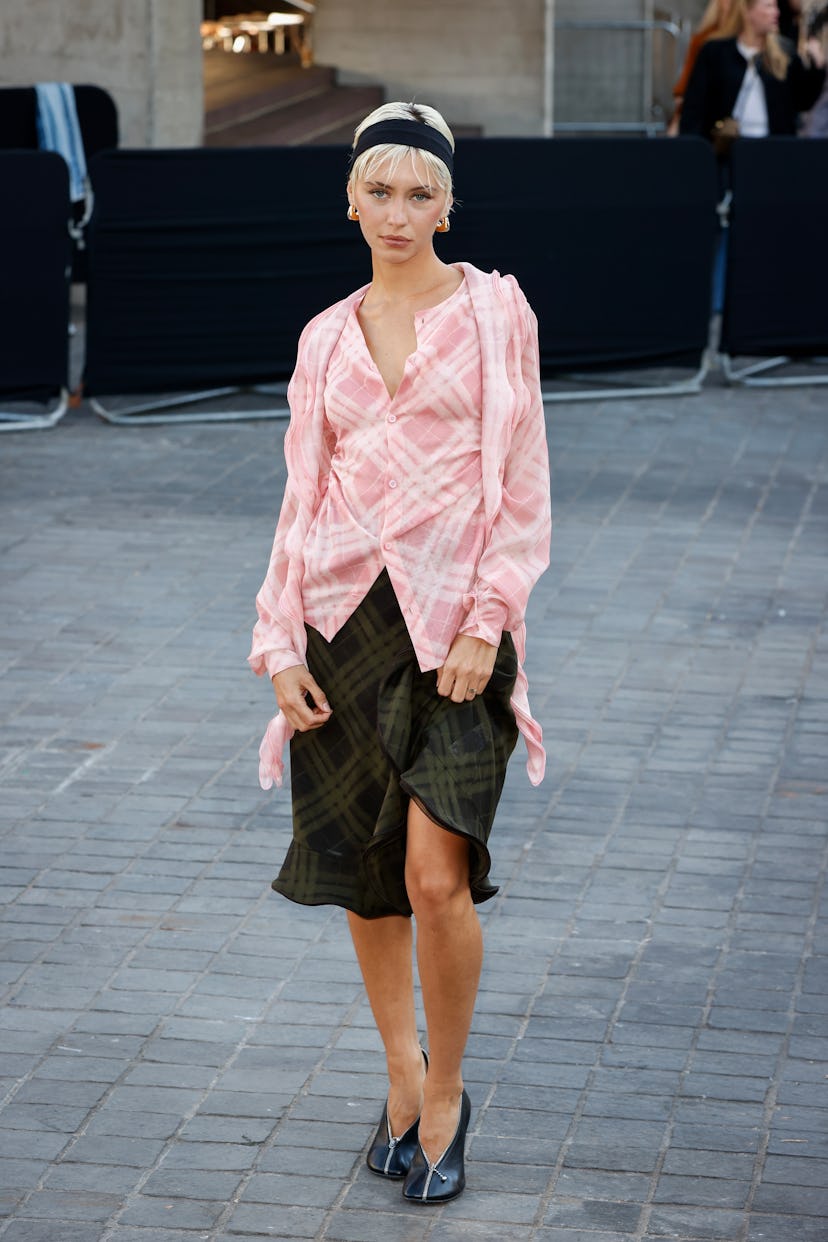 LONDON, ENGLAND - SEPTEMBER 16: Iris Law attends the Burberry show during London Fashion Week Septem...