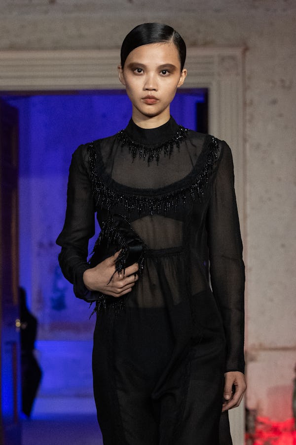 Grey goth girl eye makeup was spotted at Huishan Zhang.