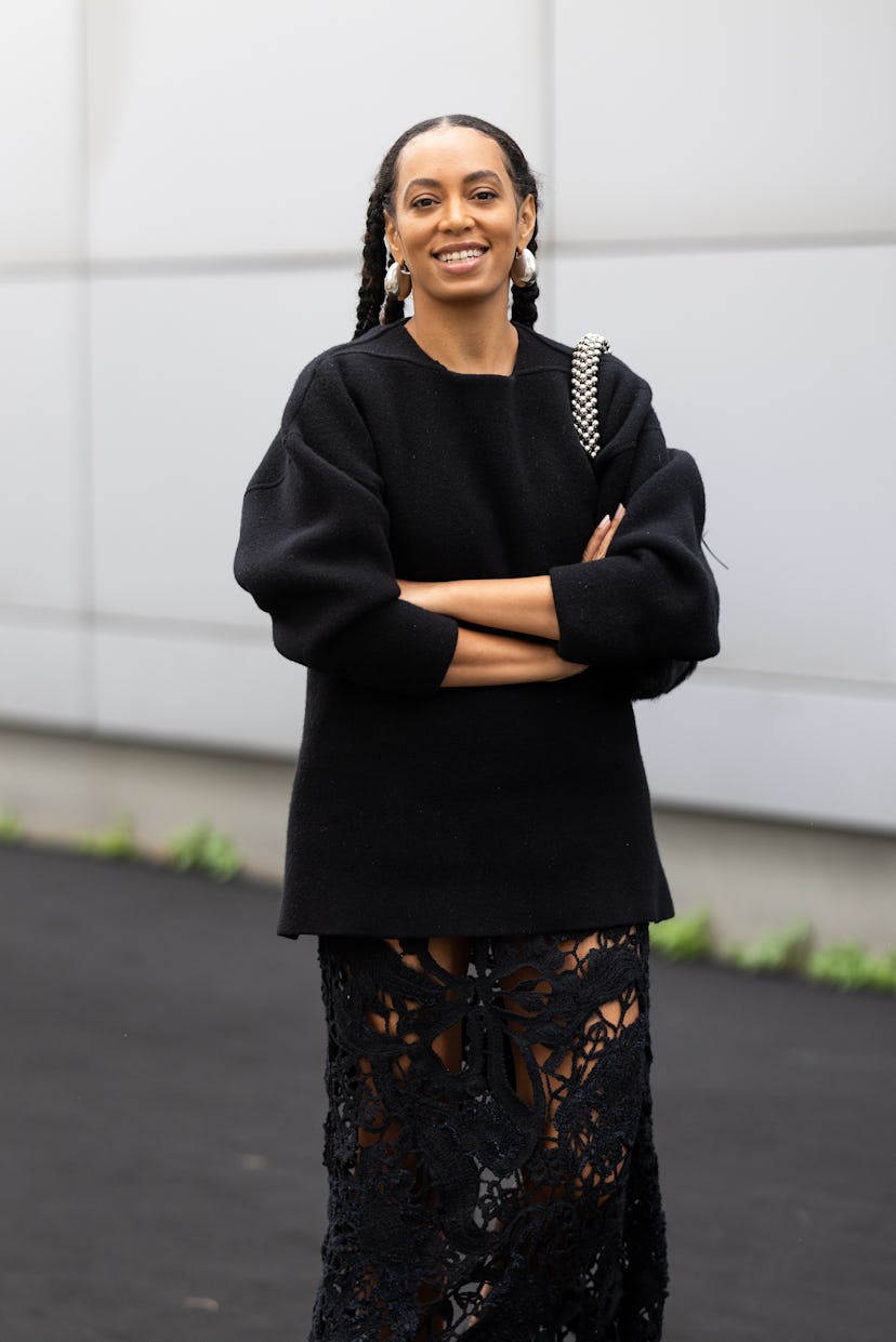 MILAN, ITALY - SEPTEMBER 18: Solange Knowles is seen wearing hoop silver earrings, a black long swea...