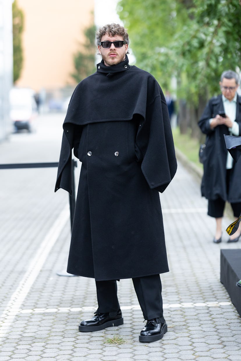 MILAN, ITALY - SEPTEMBER 18: Jack Harlow is seen wearing black leather shoes, black trousers, black ...