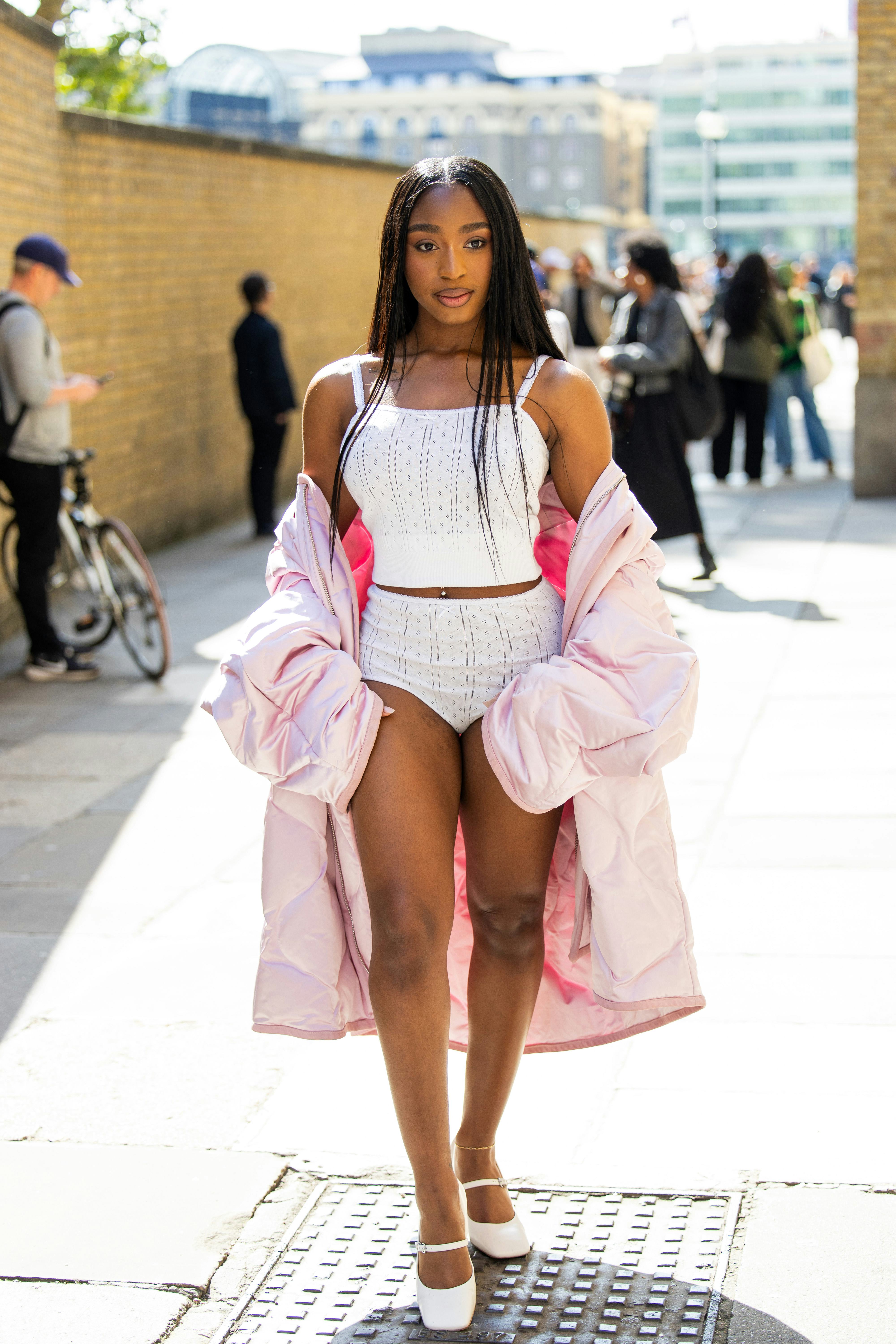 Normani wears pink puffer jacket, white top outside JW Anderson during London Fashion Week September&hellip;