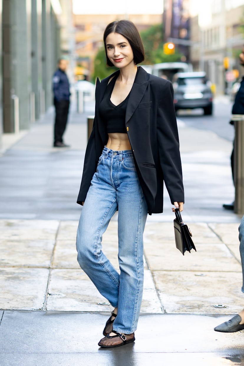 NEW YORK, NEW YORK - SEPTEMBER 16: Lily Collins is seen in Hudson Square on September 16, 2024 in Ne…