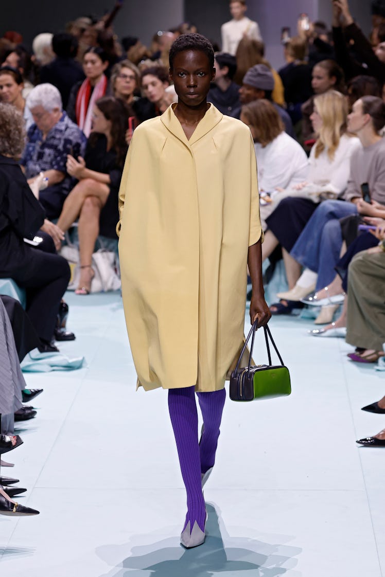 MILAN, ITALY - SEPTEMBER 19: A model walks the runway at the Prada fashion show during the Milan Wom...