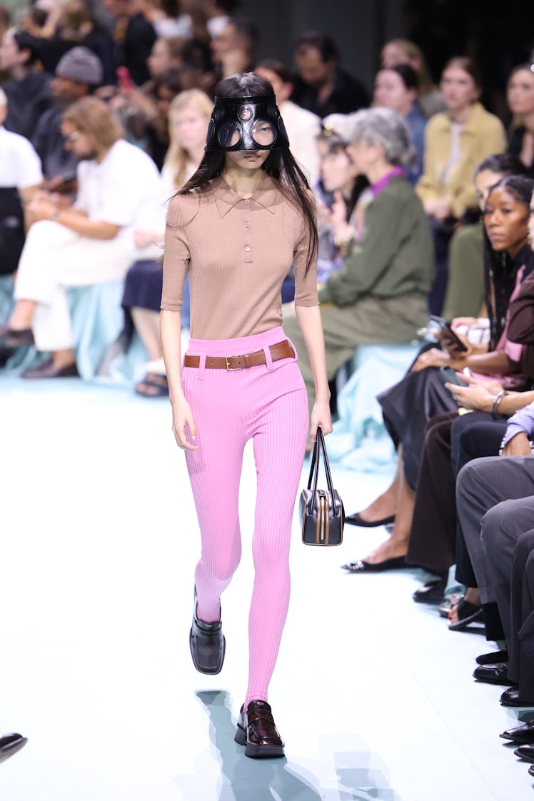 MILAN, ITALY - SEPTEMBER 19: A model walks the runway at the Prada fashion show during the Milan Wom...