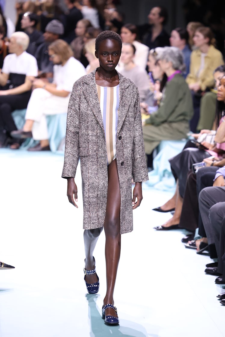 MILAN, ITALY - SEPTEMBER 19: A model walks the runway at the Prada fashion show during the Milan Wom...