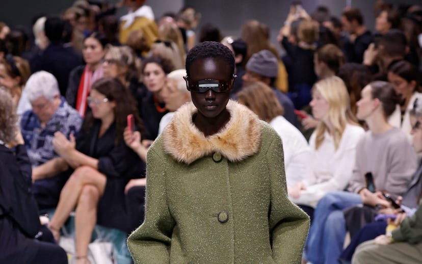 MILAN, ITALY - SEPTEMBER 19: A model walks the runway at the Prada fashion show during the Milan Wom...