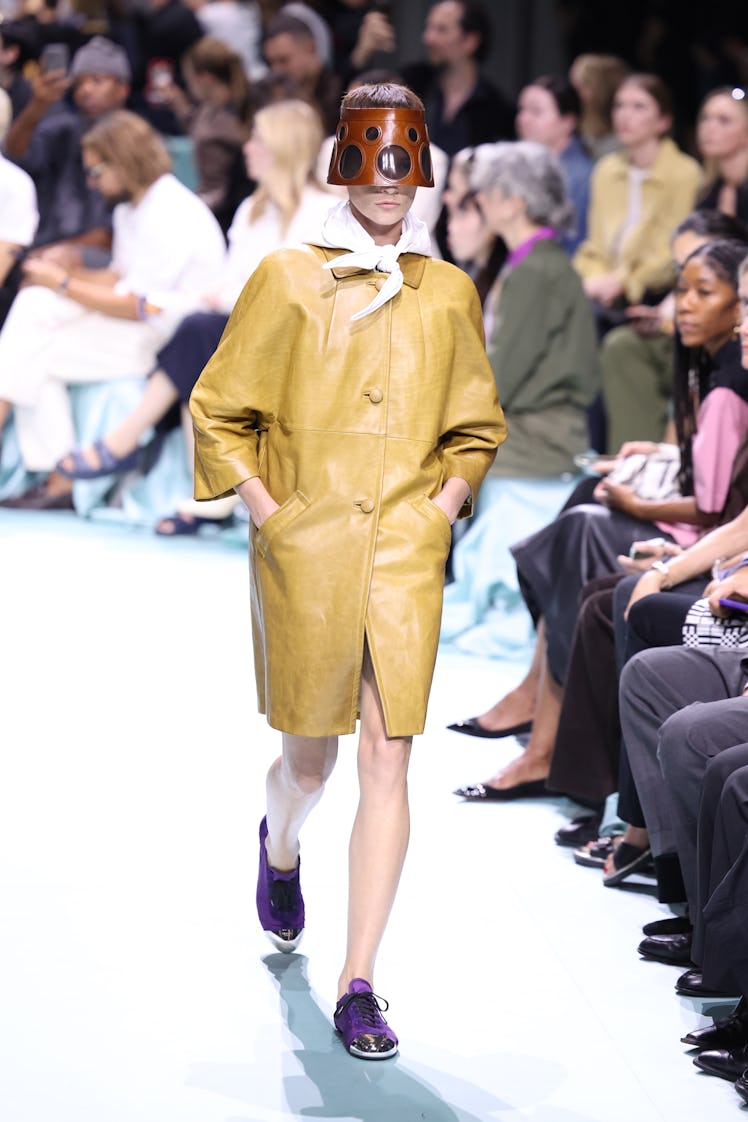 MILAN, ITALY - SEPTEMBER 19: A model walks the runway at the Prada fashion show during the Milan Wom...