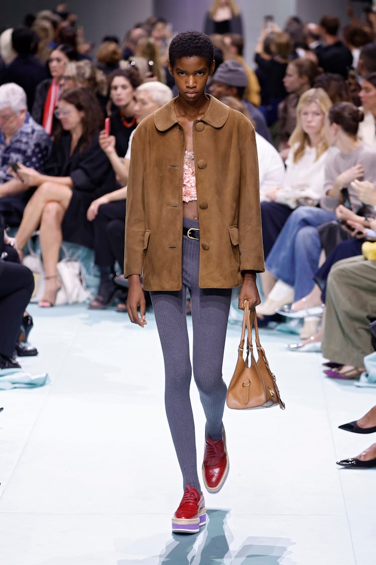 MILAN, ITALY - SEPTEMBER 19: A model walks the runway at the Prada fashion show during the Milan Wom...