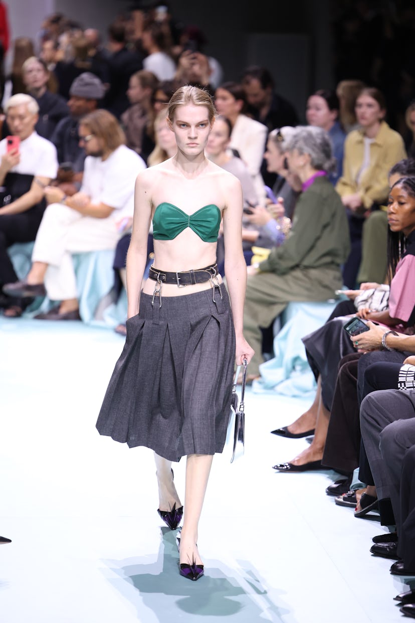 A model walks the runway at the Prada fashion show during the Milan Womenswear Spring/Summer 2025 on…