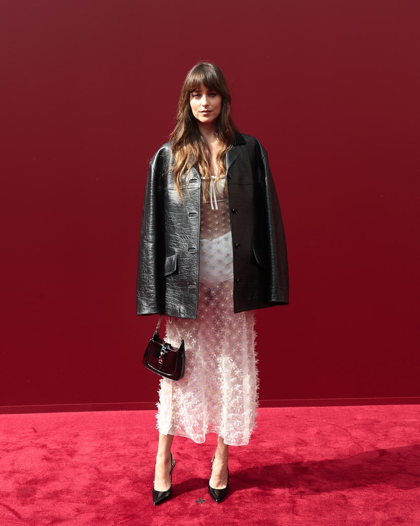 Dakota Johnson attends the Gucci Women's Spring Summer 2025 Fashion Show during the Milan Fashion W...