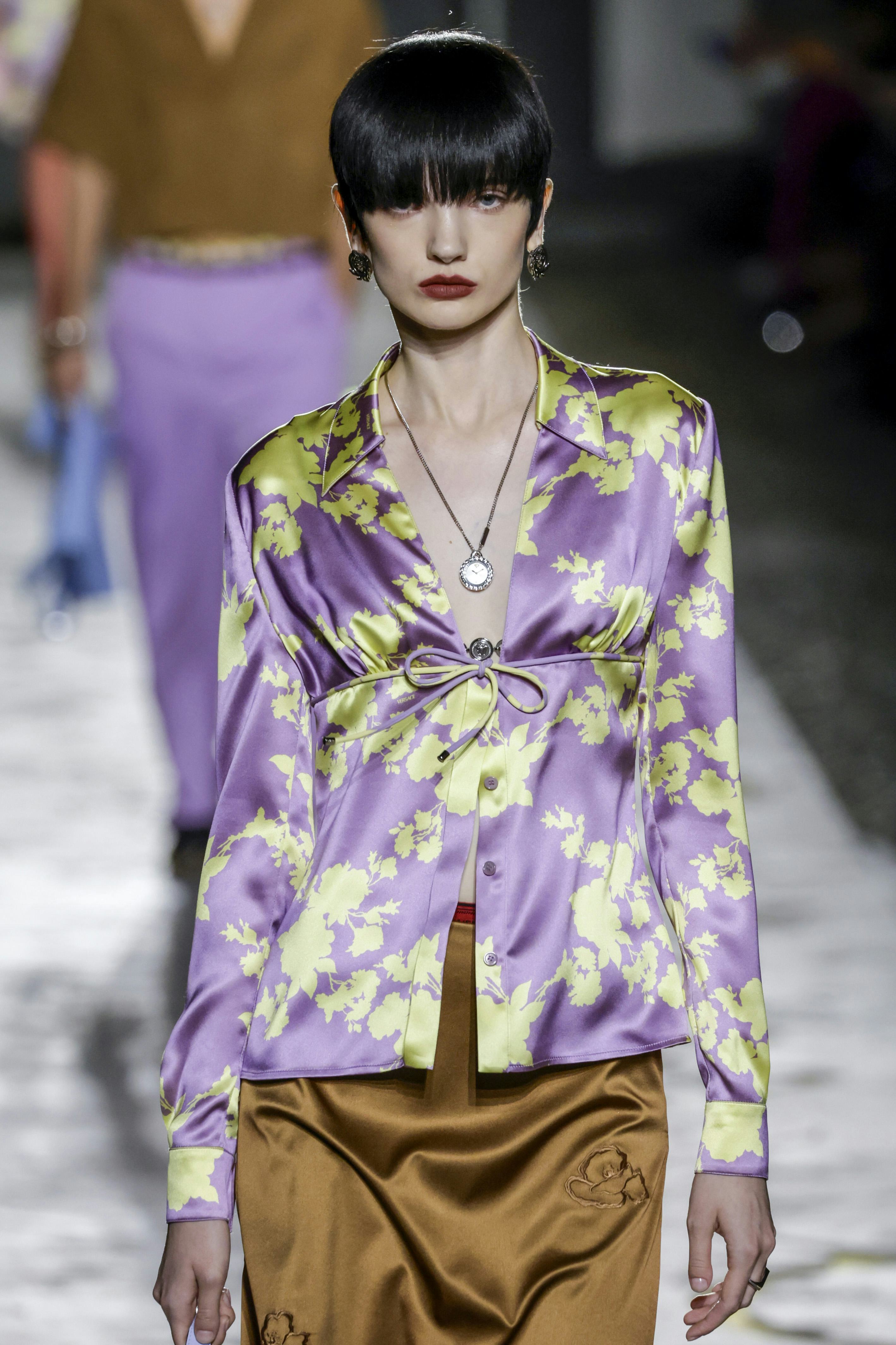 Extra-long blunt bangs were spotted at Milan Fashion Week S/S 2025.